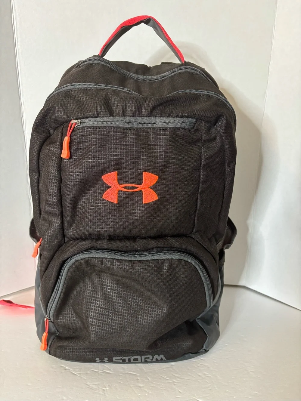 Under Armour Black Backpack with Bright Orange Logo and Accents